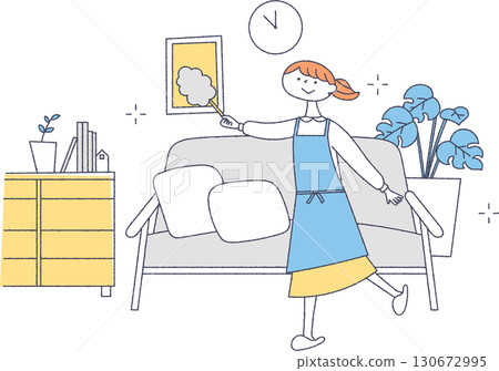 A woman cleaning the living room 130672995