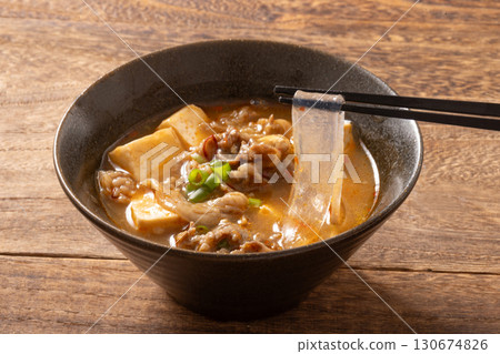 Beef mapo tofu soup with extra thick glass noodles Beef mapo tofu soup with extra thick glass noodles 130674826