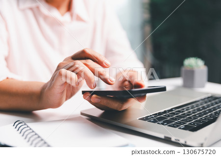 Closeup of woman holding smartphone hand shows using mobile phone technology browse online shopping, social media, engaging in fast-paced world of cyberspace. online shopping, social media network Closeup of woman holding smartphone hand shows using mobile phone technology browse online shopping, social media, engaging in fast-paced world of cyberspace. online shopping, social media network 130675720