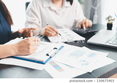 Business meeting, data analytics or women with graph presentation in office. Chart, analysis accounting team brainstorming economy, inflation or solution. business project finance investment concept. Business meeting, data analytics or women with graph presentation in office. Chart, analysis accounting team brainstorming economy, inflation or solution. business project finance investment concept. 130675903