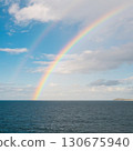 A rainbow over the ocean 130675940