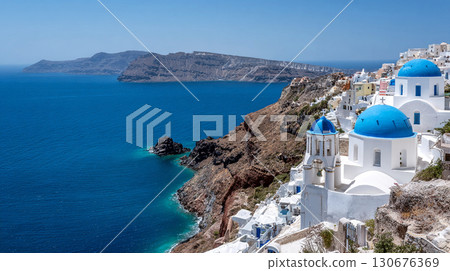 Santorini Blue Domed Churches and Stunning Aegean Sea View on Greek Island Cliffside Village 130676369