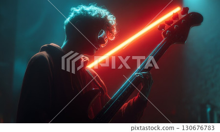Musician playing bass guitar under neon lights 130676783