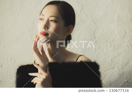 Woman wearing fur Woman wearing fur 130677316