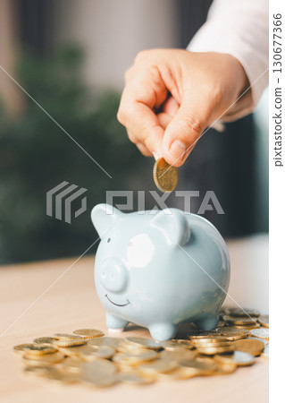 Hand holding coin symbolizes saving, investment, smart finance decisions money, currency, cash financial wealth, driving business growth, economic stability, long-term success in banking economy. Hand holding coin symbolizes saving, investment, smart finance decisions money, currency, cash financial wealth, driving business growth, economic stability, long-term success in banking economy. 130677366