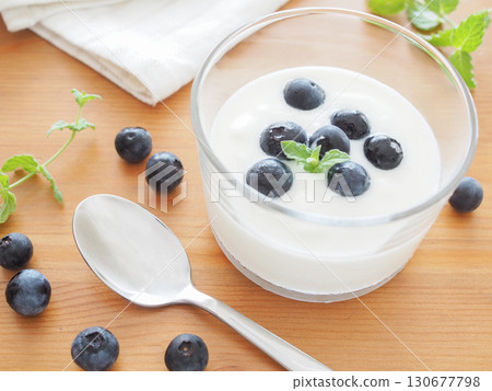 Yogurt with blueberries 130677798