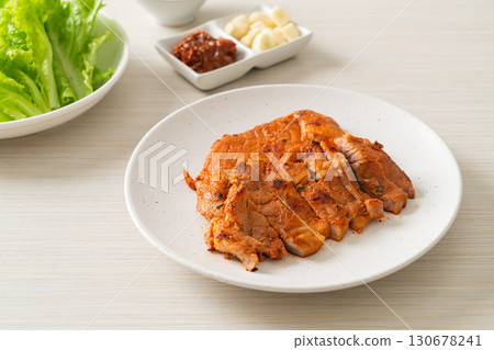grilled pork marinated Kochujang sauce in Korean style with vegetable and kimchi grilled pork marinated Kochujang sauce in Korean style with vegetable and kimchi 130678241
