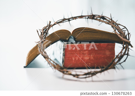 Crown of thorns is holy symbol in Christianity, representing sacrifice of Jesus Christ as described in Bible and serving as powerful reminder of faith, religion, spirituality and meaning of Easter. 130678263