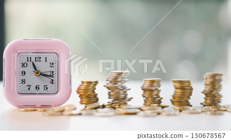 Finance and banking, saving coins, cash, gold while making smart investments in business, currency can build wealth, increase profit, achieve financial success that adds value to overall economy. 130678567