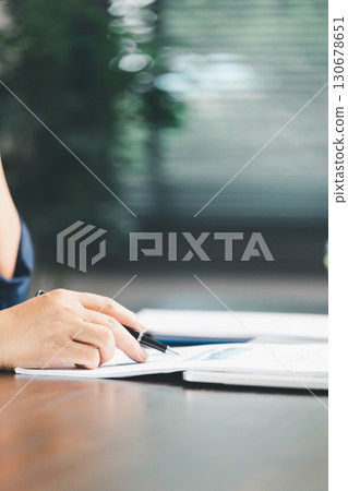 Consultant facilitates consultation between bookkeepers, lawyer to review accounting balance sheet, stock market statistics, yearly tax obligations, ensuring business is protected from bribery, law. 130678651