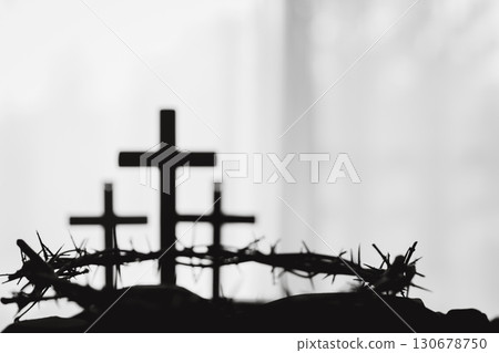 Cross and crown of thorns, often seen in gold crucifix symbols, represent the sacrifice of Jesus Christ-central to Easter message and the foundation of faith in the Christian religion. Cross and crown of thorns, often seen in gold crucifix symbols, represent the sacrifice of Jesus Christ-central to Easter message and the foundation of faith in the Christian religion. 130678750