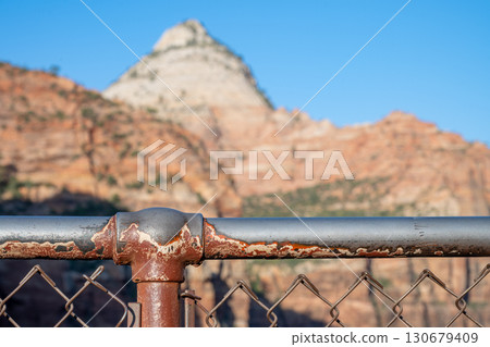 Selective focus on the guardrail at the top of the zion national park overlook trail 130679409