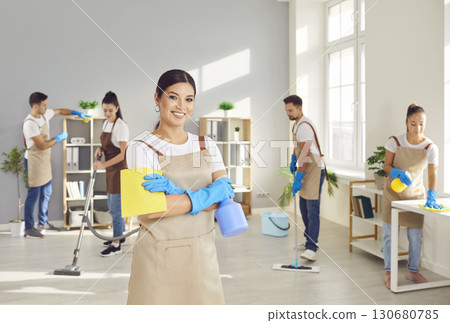 Portrait of Happy Woman Cleaner at Home or Office 130680785