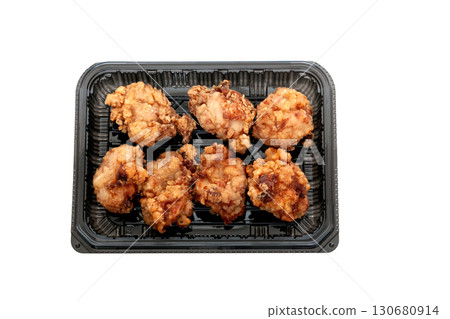 Food pack containing fried chicken thighs with fragrant bonito broth and soy sauce [white background, cutout] 130680914