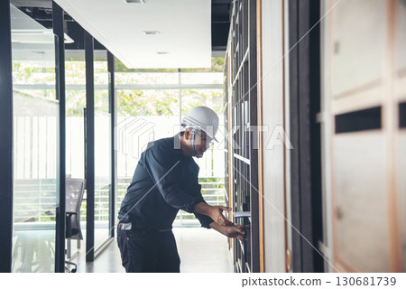 Man construction engineer writing note wear blue shirt safety white hard hat at construction site. Industry labour male worker. Architecture man drawing engineer civil constrcution real estate 130681739