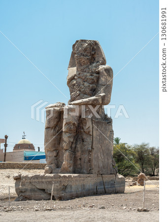The Colossi of Memnon Standing Against a Mountainous Backdrop The Colossi of Memnon Standing Against a Mountainous Backdrop 130681991