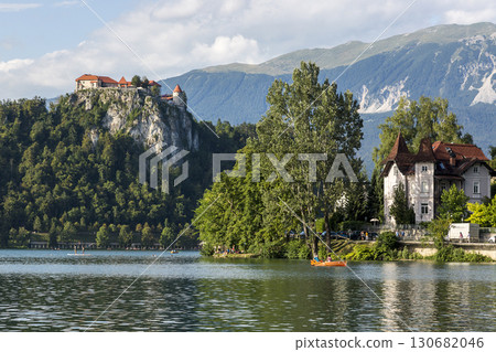 Bled, Slovenia - August 15, 2019: View of the old castle and Lake Bled in Slovenia 130682046