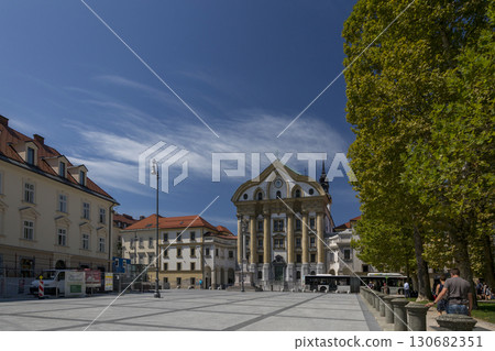Ljubljana, Slovenia - August 15, 2019: Congress Square and the Ursulin Church of the Holy Trinity in Ljubljana Ljubljana, Slovenia - August 15, 2019: Congress Square and the Ursulin Church of the Holy Trinity in Ljubljana 130682351