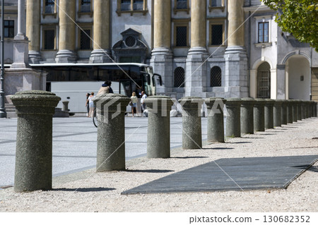 Ljubljana, Slovenia - August 15, 2019: Fencing on the Congress Square in Ljubljana Ljubljana, Slovenia - August 15, 2019: Fencing on the Congress Square in Ljubljana 130682352