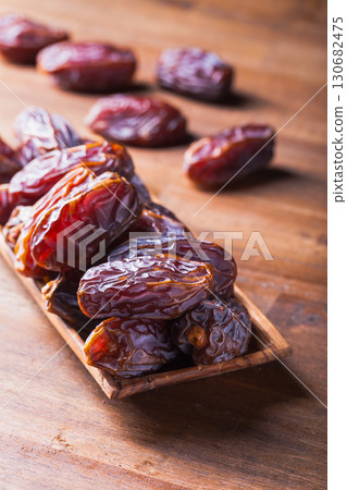 Dates on a old wooden table. Dates on a old wooden table. 130682475