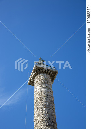 Rome, Italy - August 16, 2019: Column of Marcus Aurelius on Piazza Colonna in the center of Rome 130682734