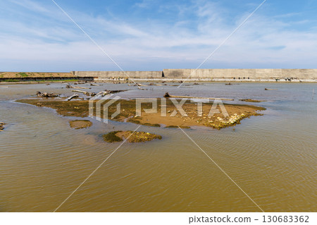 A port where the seabed rose due to the earthquake and tsunami A port where the seabed rose due to the earthquake and tsunami 130683362