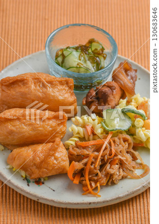 Inari sushi on a plate Inari sushi on a plate 130683646