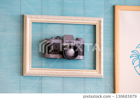 Cute camera. Cafe interior. Resort hotel near the port. Naha Tomari Port, Naha City, Okinawa Prefecture - June 2, 2025 130683879