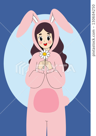 Girl in Bunny Costume Holding Flower 130684250