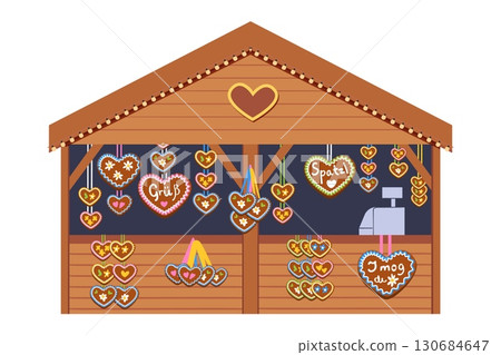 Oktoberfest market stall with hanging heart shaped gingerbread cookies decorated with icing and German love messages 130684647