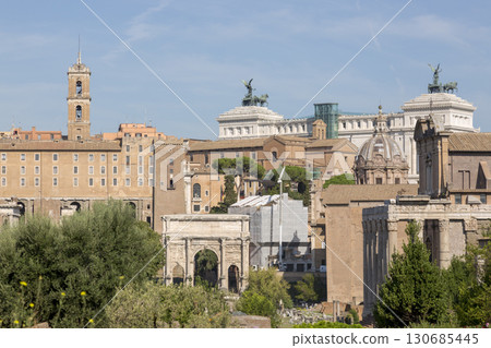 Rome, Italy - August 17, 2019: View of the ancient structures of the Roman Forum Rome, Italy - August 17, 2019: View of the ancient structures of the Roman Forum 130685445