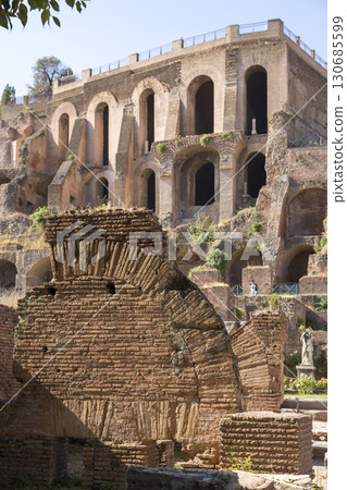 Rome, Italy - August 17, 2019: View of the ancient structures of the Roman Forum Rome, Italy - August 17, 2019: View of the ancient structures of the Roman Forum 130685599
