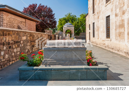 Mevlana Museum courtyard with ornate tomb and historic architecture in Konya, Turkey 130685727