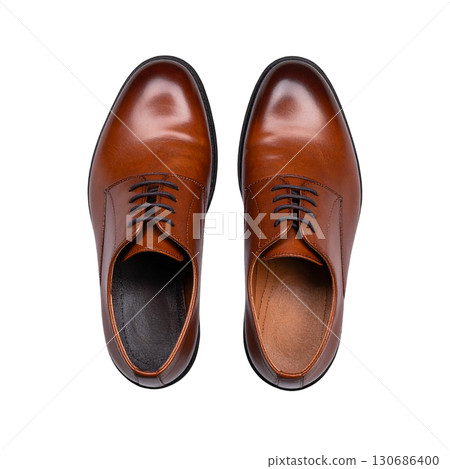Brown leather shoes isolated on white background. 130686400