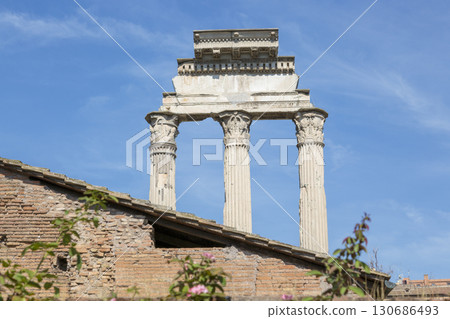 Rome, Italy - August 17, 2019: Three columns of the Temple of Dioscuri - one of the oldest temples in the Roman Forum 130686493