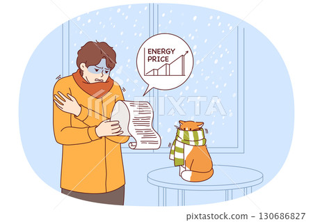 Rising prices for electricity cause stress for man studying bill, standing in cold apartment Rising prices for electricity cause stress for man studying bill, standing in cold apartment 130686827