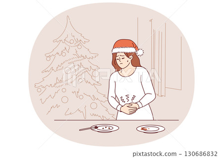 Stomach pain caused by overeating at christmas dinner plagues woman in need of medication 130686832