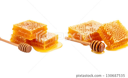 Close-up of golden honey in glass jar and natural honeycomb isolated on white background. 130687535