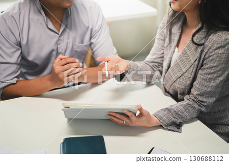Business meeting concept with people discussing performance data and statistics, Business meeting concept with people discussing performance data and statistics, 130688112