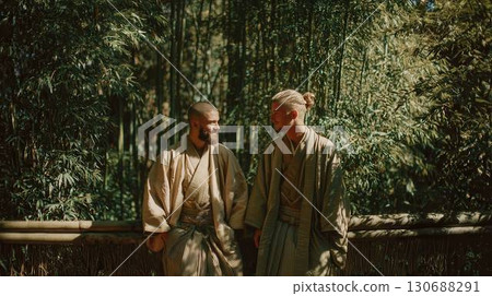 Two male travelers dressed as samurai deepen their friendship 130688291