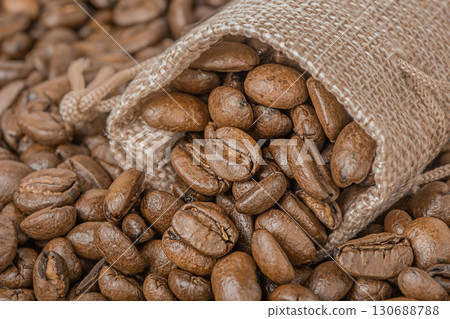Coffee beans in a bag as a background. 130688788