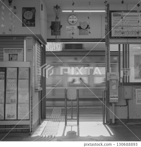 A train passing through an unmanned station 130688893