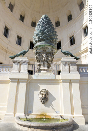 Rome, Italy - August 17, 2019: Bronze sculpture Pine cone in front of the Belvedere Palace in the Vatican, I-II century AD Rome, Italy - August 17, 2019: Bronze sculpture Pine cone in front of the Belvedere Palace in the Vatican, I-II century AD 130689565