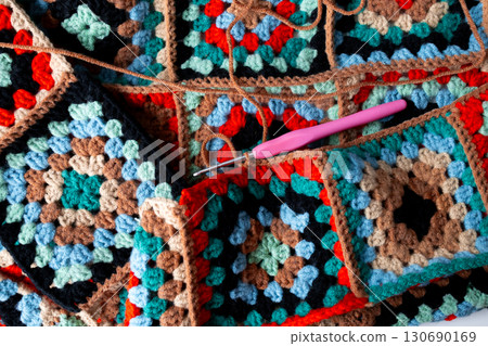 Colorful granny square crochet patterns with pink hook Colorful granny square crochet patterns with pink hook 130690169