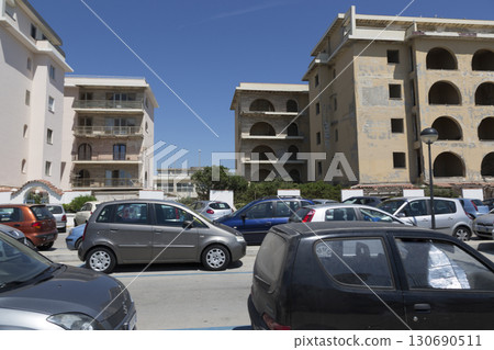 Castel Volturno, Italy - August 18, 2019: Embankment by the sea in Castel Volturno in Italy 130690511