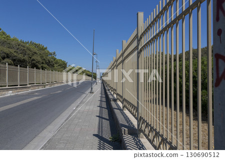 Castel Volturno, Italy - August 18, 2019: Road to the sea in the city of Castel Volturno in Italy 130690512