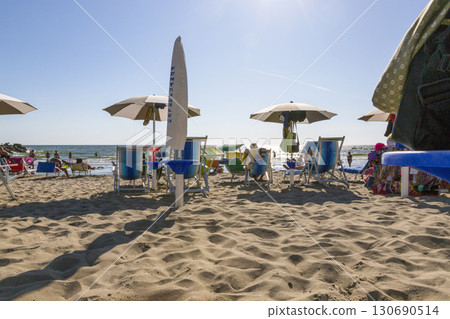 Castel Volturno, Italy - August 18, 2019: Beach by the sea in the city of Castel Volturno in Italy 130690514