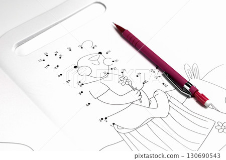 Connect the dots book with pencil lying Connect the dots book with pencil lying 130690543