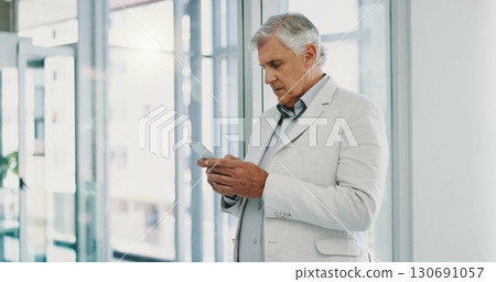 Old businessman, phone and reading chat for communication, thinking or conversation. Male corporate employee, senior professional and online planning for website feedback, social media or connection 130691057