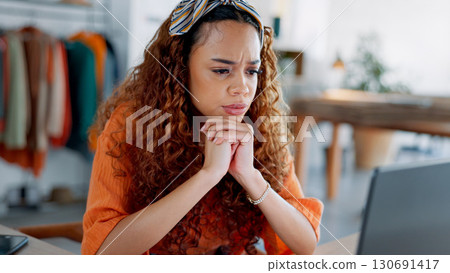 Fashion designer, woman thinking and laptop for e commerce ideas, problem solving and market research. Young entrepreneur or clothes seller reading reviews on computer, online shop profit or solution 130691417